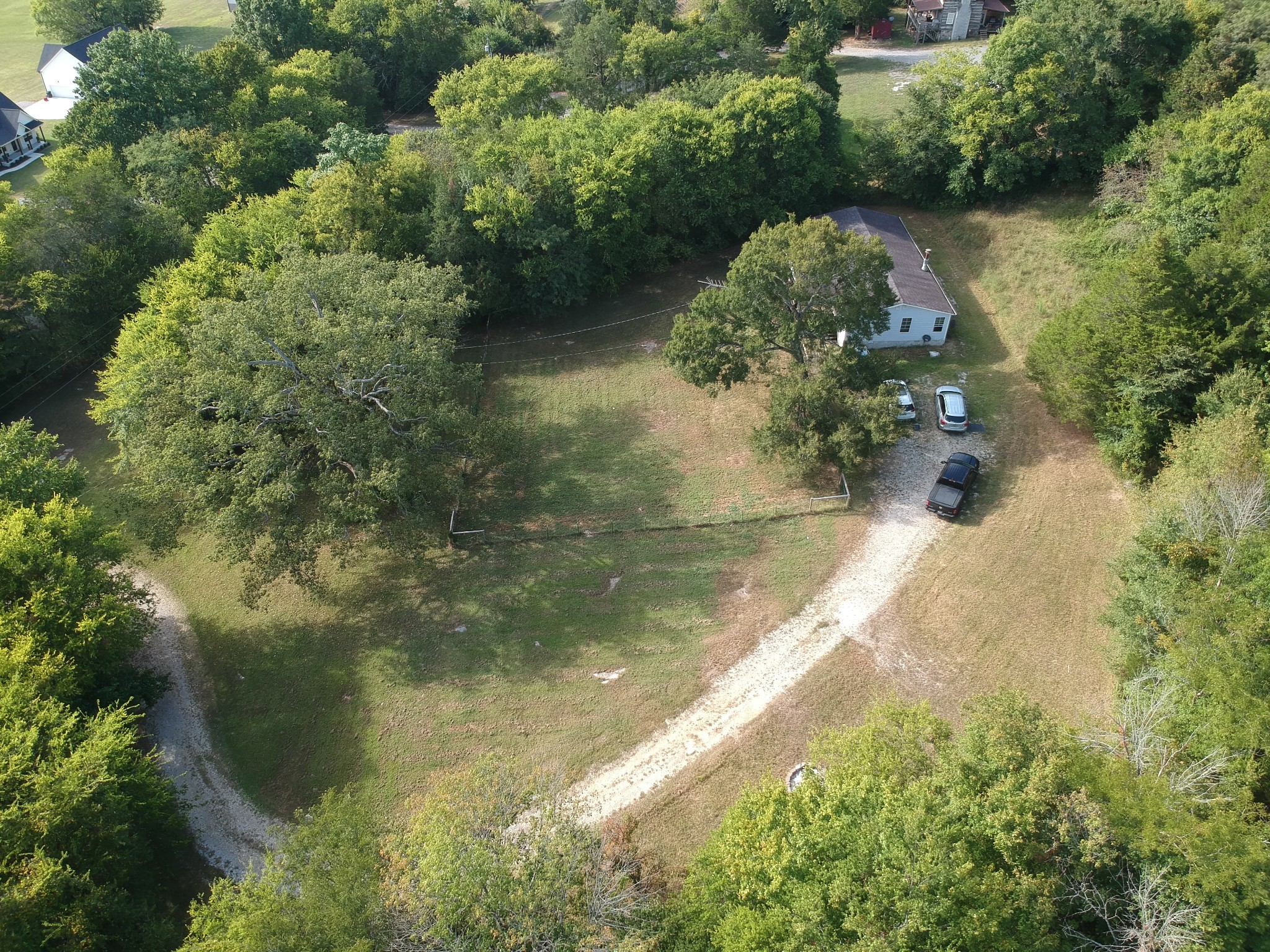 225 Opossum Hollow Road Watertown, TN 37184 - Photo 26 of 29 an aerial view of a residential houses with outdoor space and trees