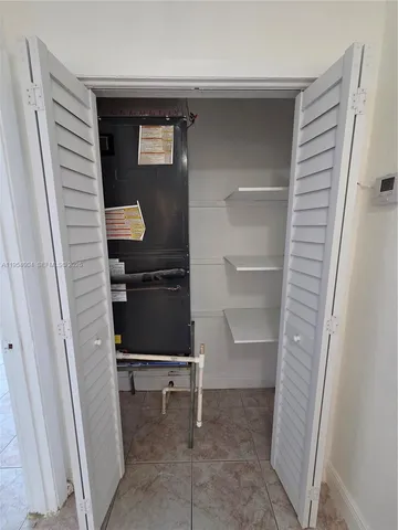 a bathroom with a toilet and a sink