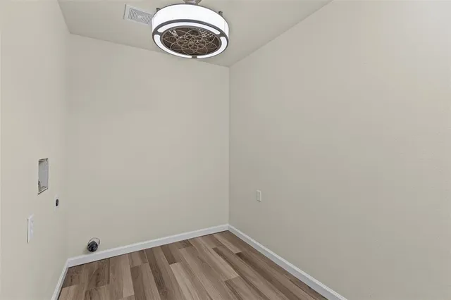 a view of a small space with racks on the wall