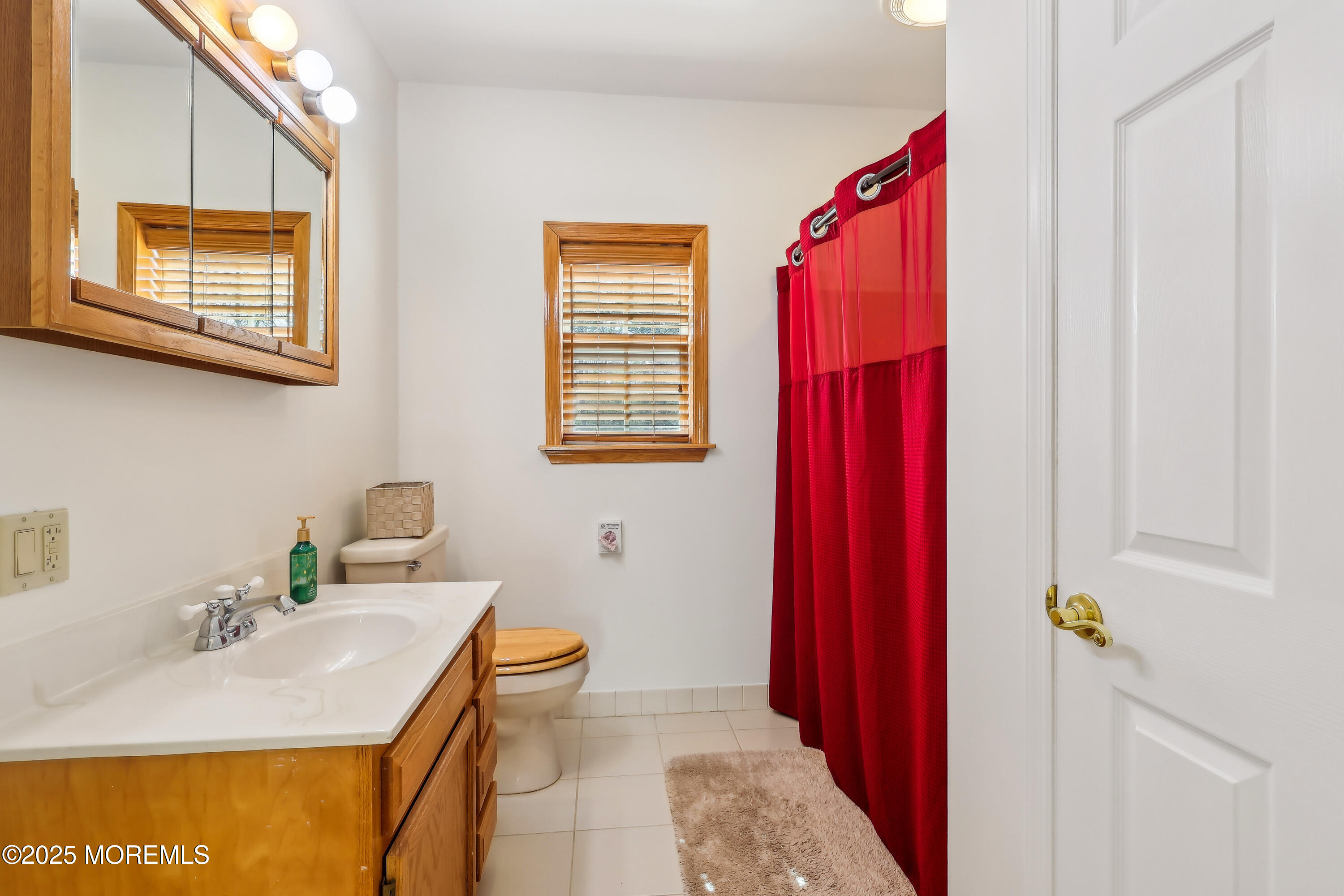 6 Meirs Road Cream Ridge, NJ 08514 - Photo 52 of 62 a bathroom with a sink vanity and a mirror
