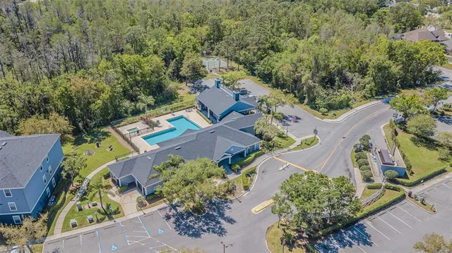 an aerial view of a house with a garden