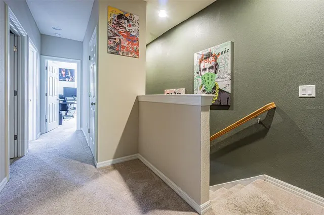 a view of hallway with stairs