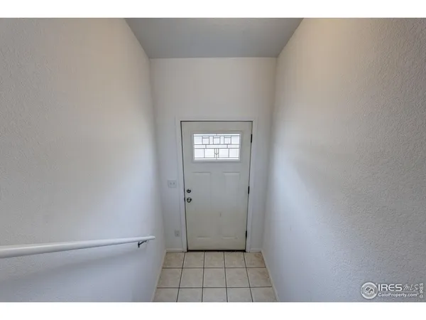 view of an empty room and window
