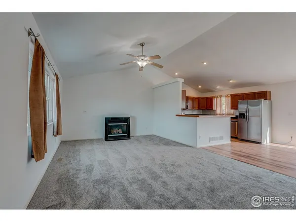 a view of a kitchen with a sink and a kitchen