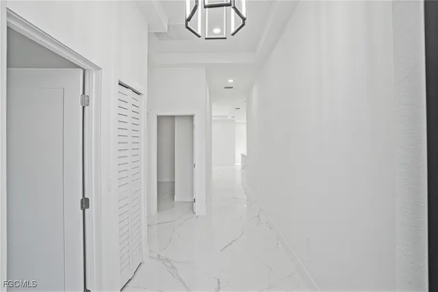 a view of a hallway with closet area