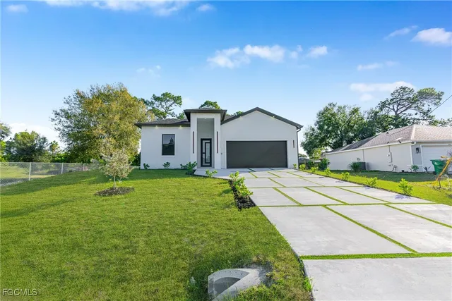 a house view with a garden space