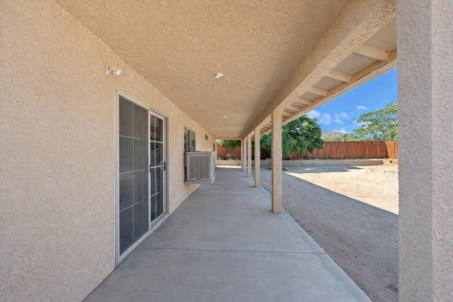 7562 Inca Trail Yucca Valley, CA 92284 - Photo 29 of 30 a view of hallway with patio