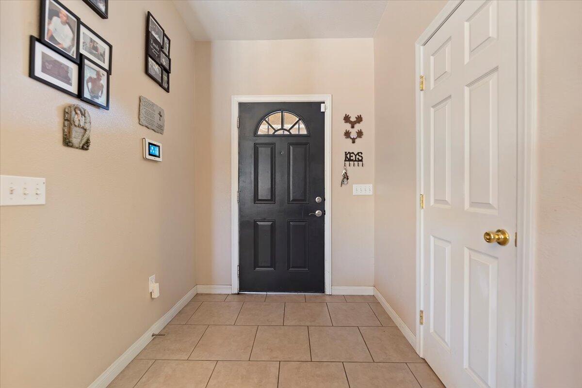7562 Inca Trail Yucca Valley, CA 92284 - Photo 5 of 30 a view of an entryway with a hallway