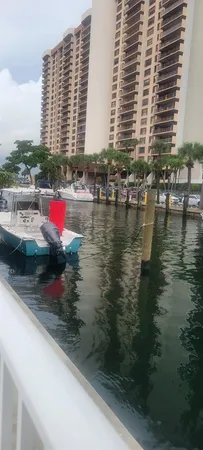 a view of swimming pool with outdoor seating