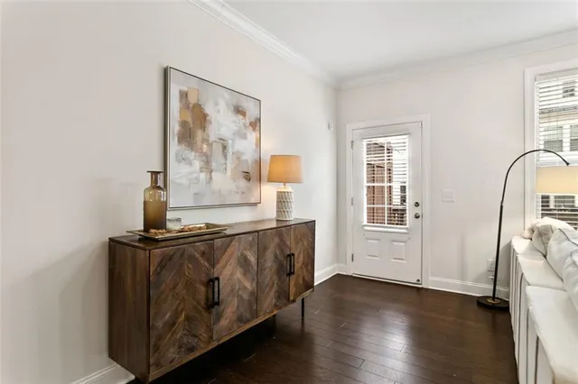 a view of a livingroom with furniture and wooden floor