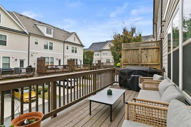 a view of a brick building from a balcony