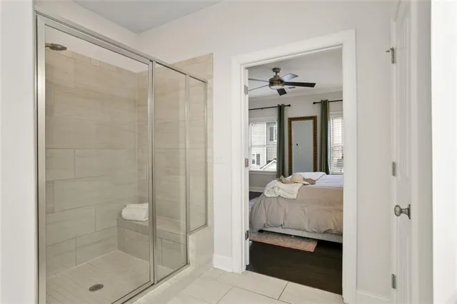a bathroom with a shower and a toilet