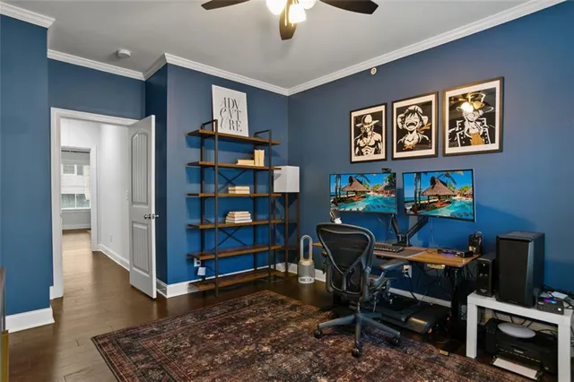 a bathroom with a sink a toilet a mirror and shower