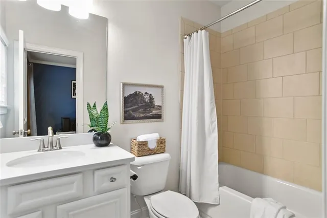 a bedroom with a bed a desk and chair