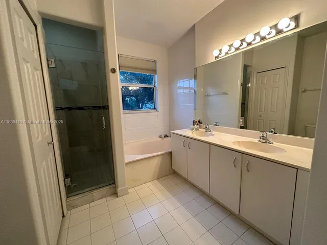 a view of front door with wooden floor
