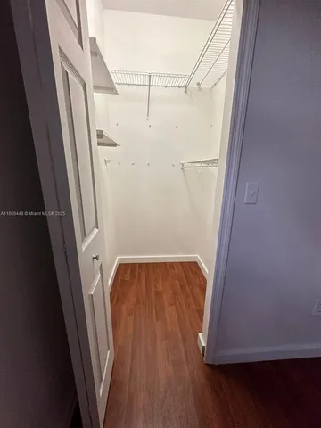 a view of an house with backyard and kitchen