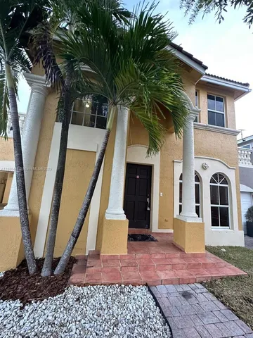a view of a house with a garage