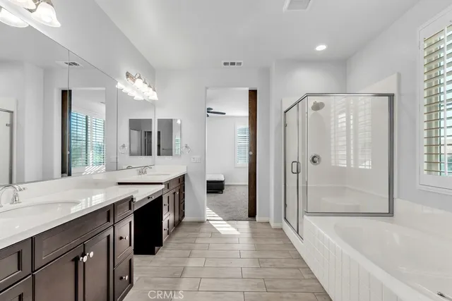 a view of a sink and a cabinets