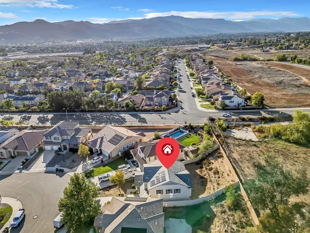 a view of a city with mountains in the background