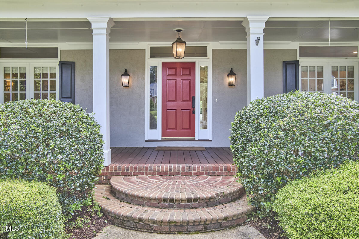 4303 Thetford Road Durham, NC 27707 - Photo 3 of 88 front view of a house with a yard