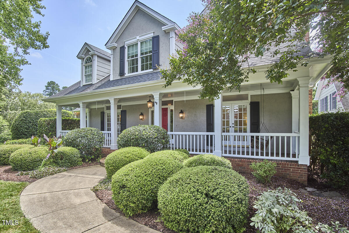 4303 Thetford Road Durham, NC 27707 - Photo 4 of 88 front view of a house with a yard