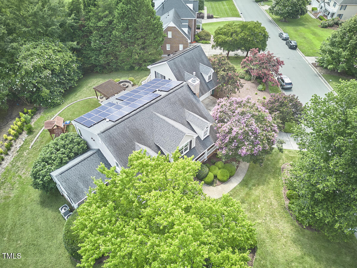 4303 Thetford Road Durham, NC 27707 - Photo 72 of 88 an aerial view of a house with yard and green space