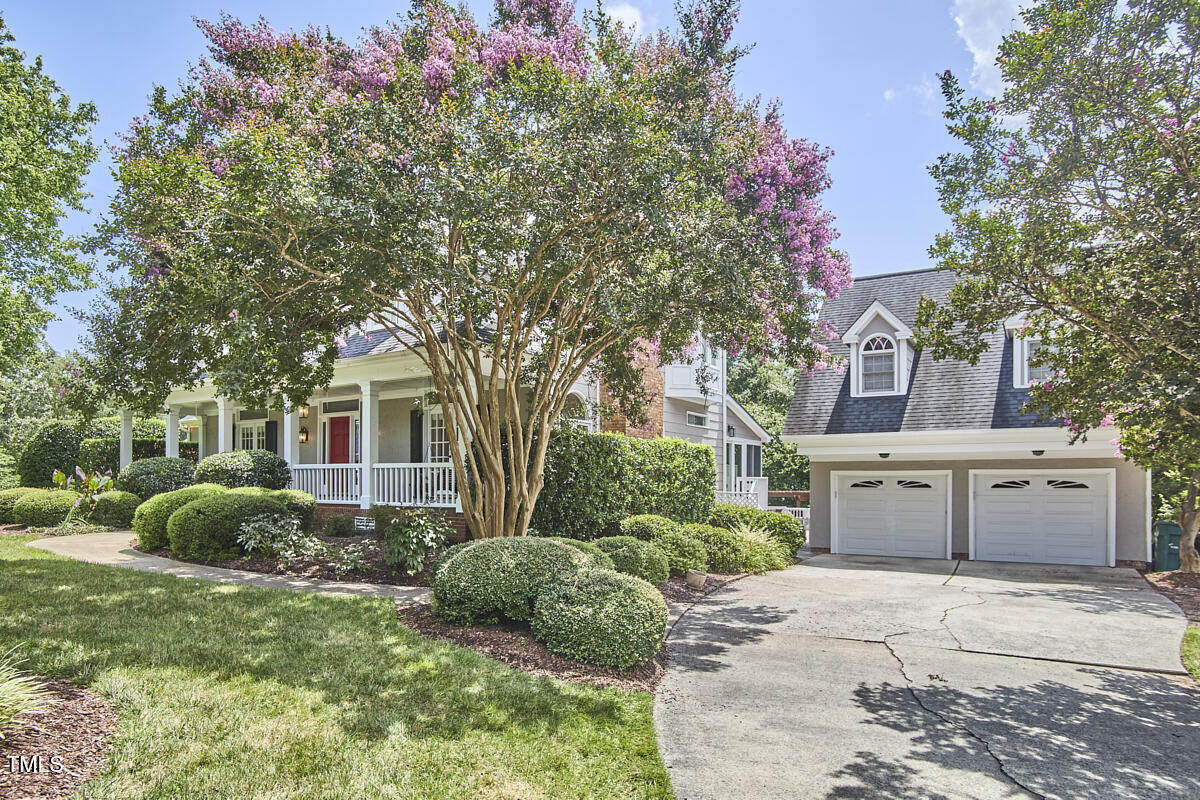 4303 Thetford Road Durham, NC 27707 - Photo 7 of 88 a view of a house with a back yard