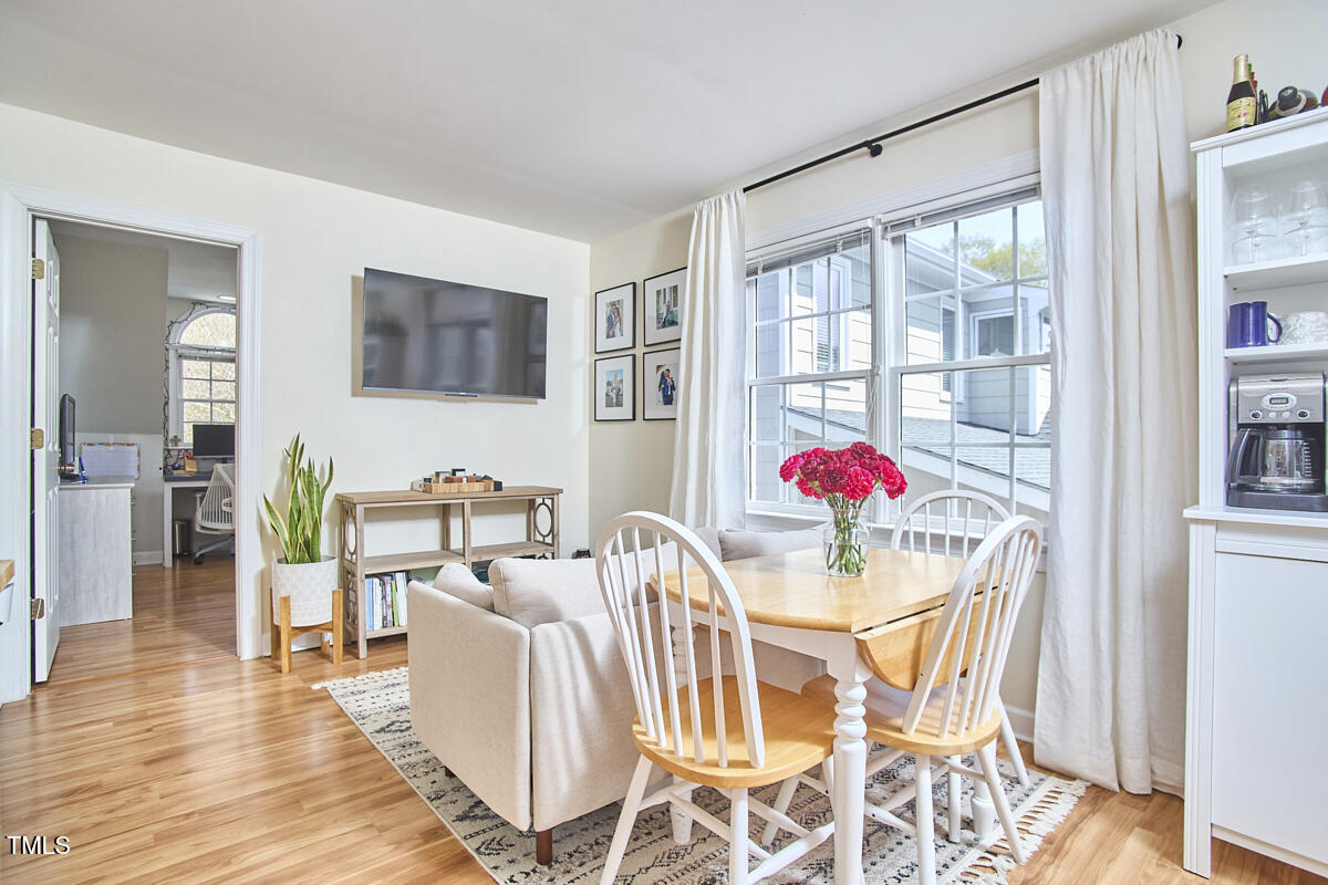 4303 Thetford Road Durham, NC 27707 - Photo 83 of 88 a view of livingroom with furniture wooden floor and windows
