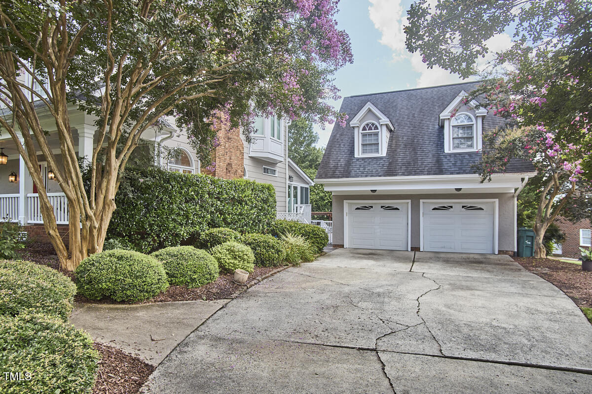 4303 Thetford Road Durham, NC 27707 - Photo 8 of 88 a view of a house with a garden