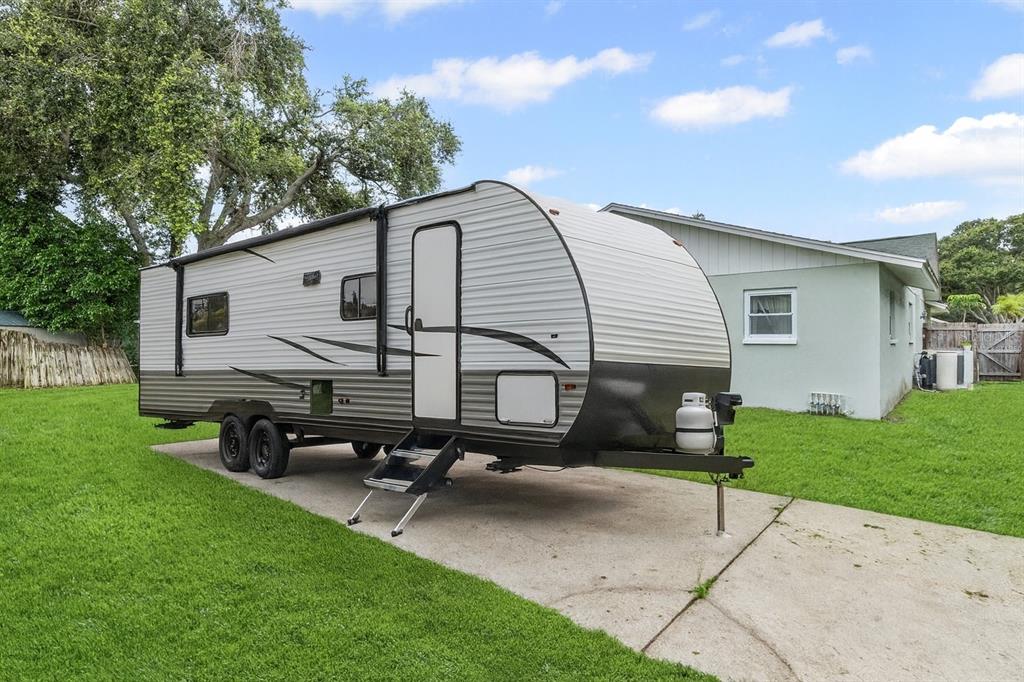 12595 93rd Way North Largo, FL 33773 - Photo 35 of 53 a view of backyard with a garden and entertaining space