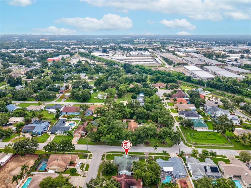 12595 93rd Way North Largo, FL 33773 - Photo 45 of 53 an aerial view of residential houses with outdoor space