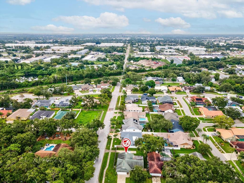 12595 93rd Way North Largo, FL 33773 - Photo 48 of 53 an aerial view of residential houses with outdoor space