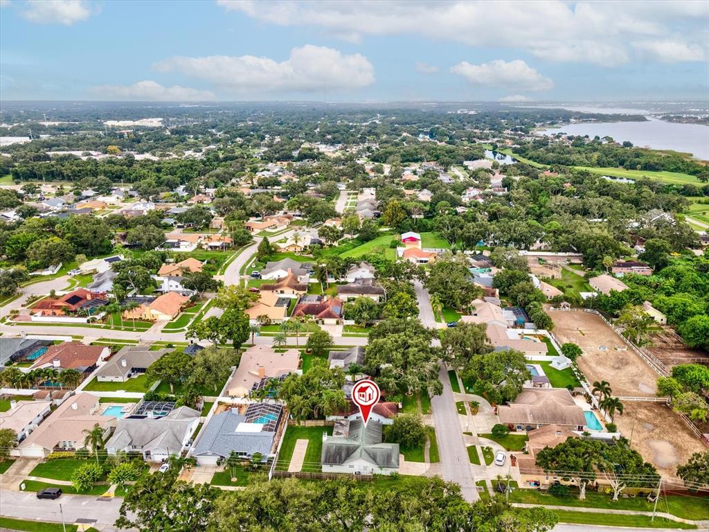 12595 93rd Way North Largo, FL 33773 - Photo 50 of 53 an aerial view of residential houses with outdoor space and trees