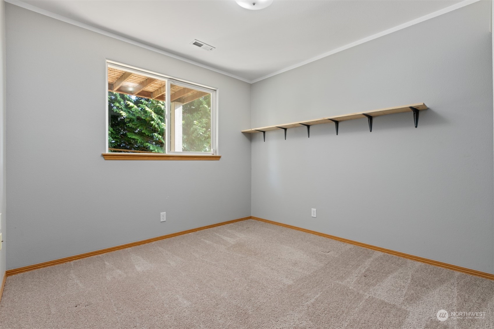 1117 58th Place Southwest Everett, WA 98203 - Photo 18 of 25 an empty room with a window