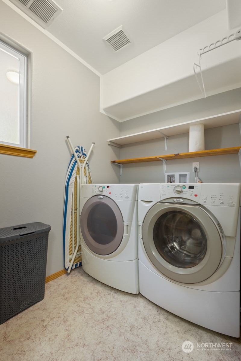 1117 58th Place Southwest Everett, WA 98203 - Photo 24 of 25 a utility room with dryer and washer