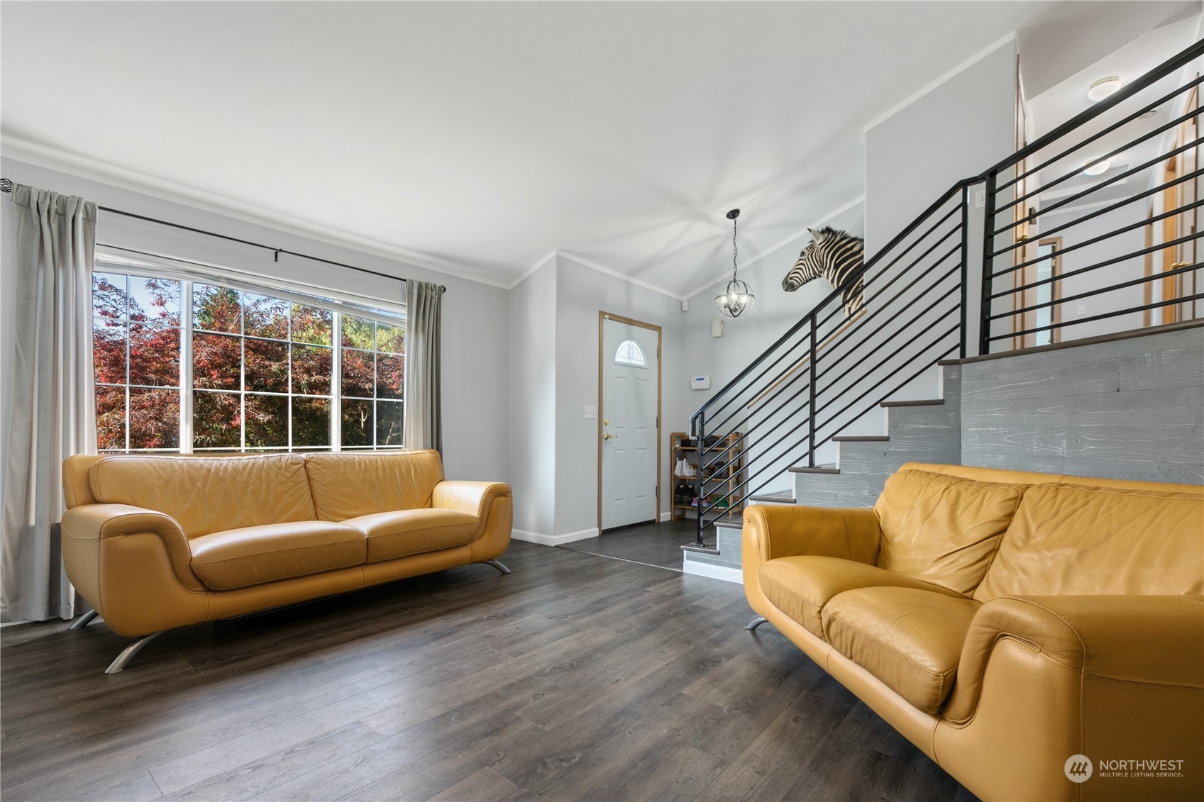 1117 58th Place Southwest Everett, WA 98203 - Photo 4 of 25 a living room with furniture and a large window