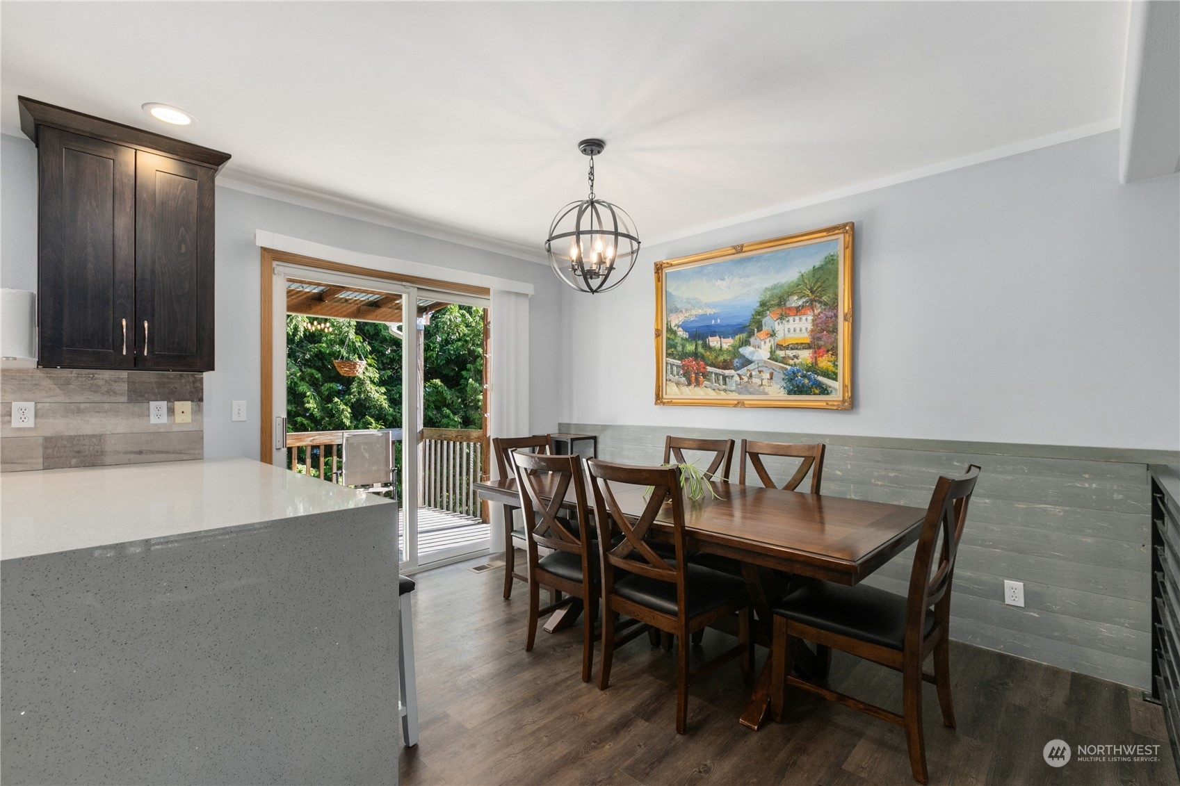 1117 58th Place Southwest Everett, WA 98203 - Photo 9 of 25 a view of a dining room with furniture window and wooden floor