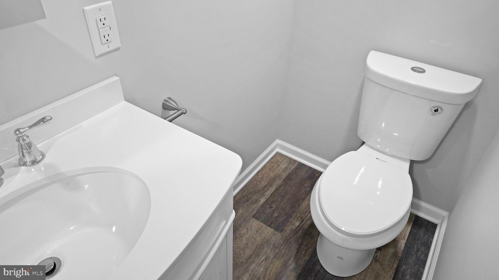 233 Main Street Hartly, DE 19953 - Photo 18 of 26 a bathroom with a toilet and a sink