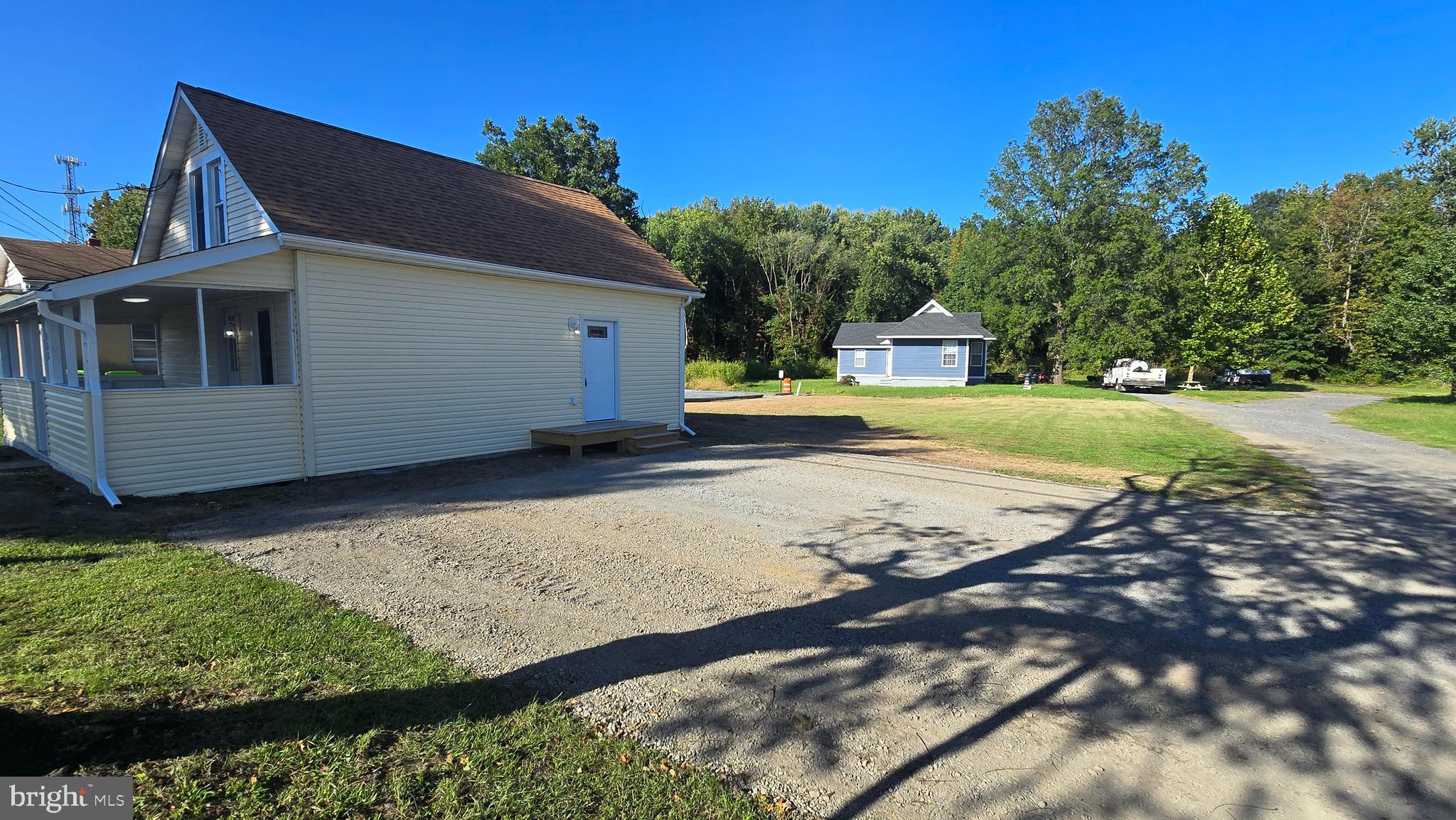 233 Main Street Hartly, DE 19953 - Photo 25 of 26 a view of a house with backyard and trees