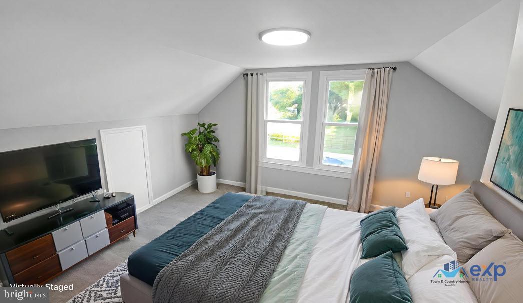 233 Main Street Hartly, DE 19953 - Photo 7 of 26 a bedroom with a bed and a flat screen tv