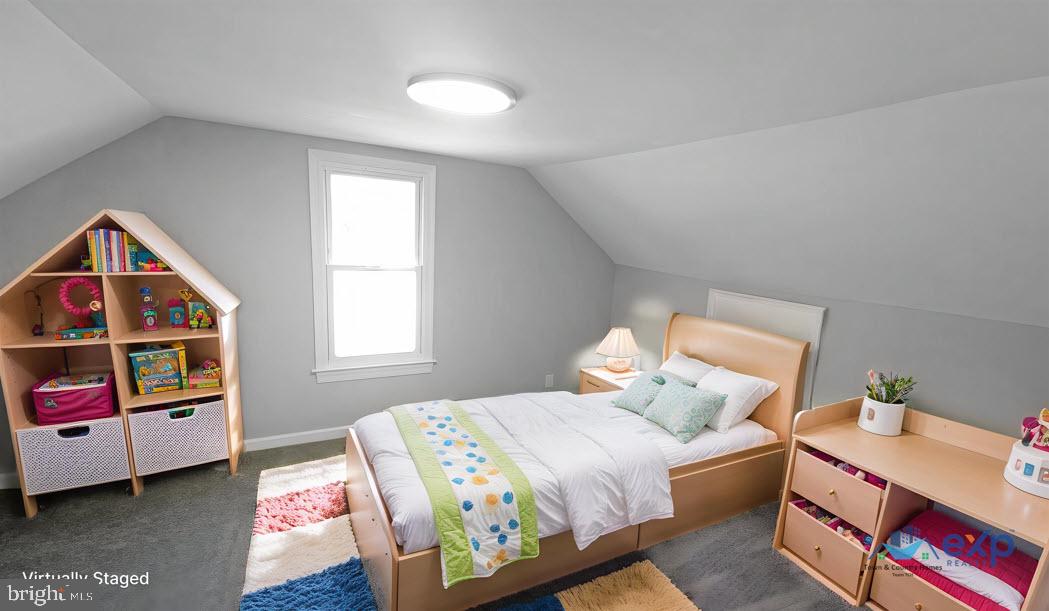 233 Main Street Hartly, DE 19953 - Photo 8 of 26 a bedroom with a bed and a window