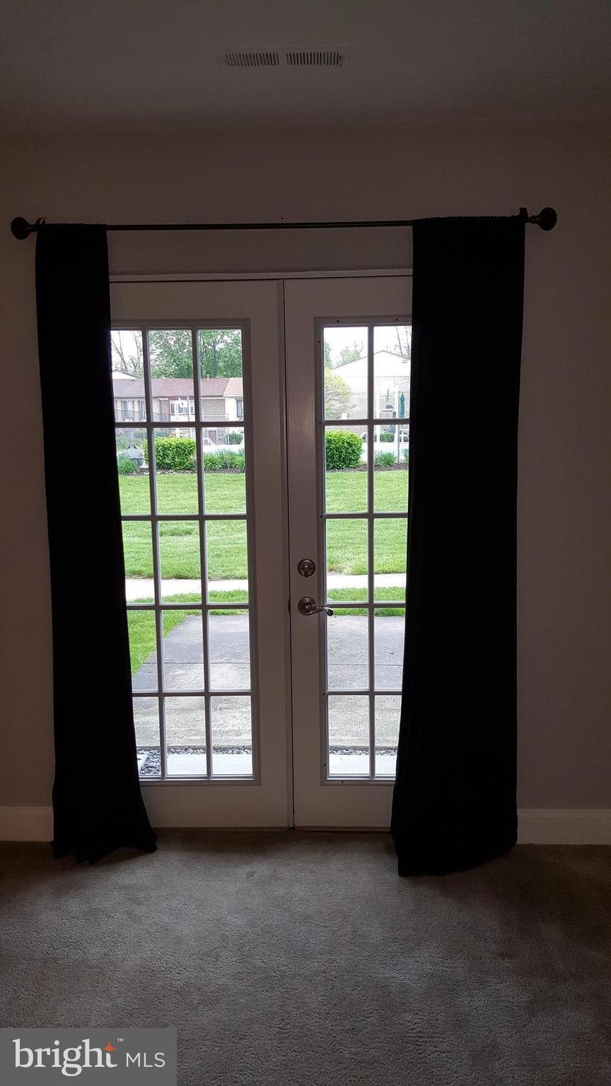 2392 Sun Valley Circle, Unit 2LM Silver Spring, MD 20906 - Photo 21 of 28 French Doors leading out to patio