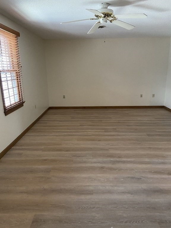15 A Hawthorne Village, Unit D Franklin, MA 02038 - Photo 17 of 18 wooden floor in an empty room