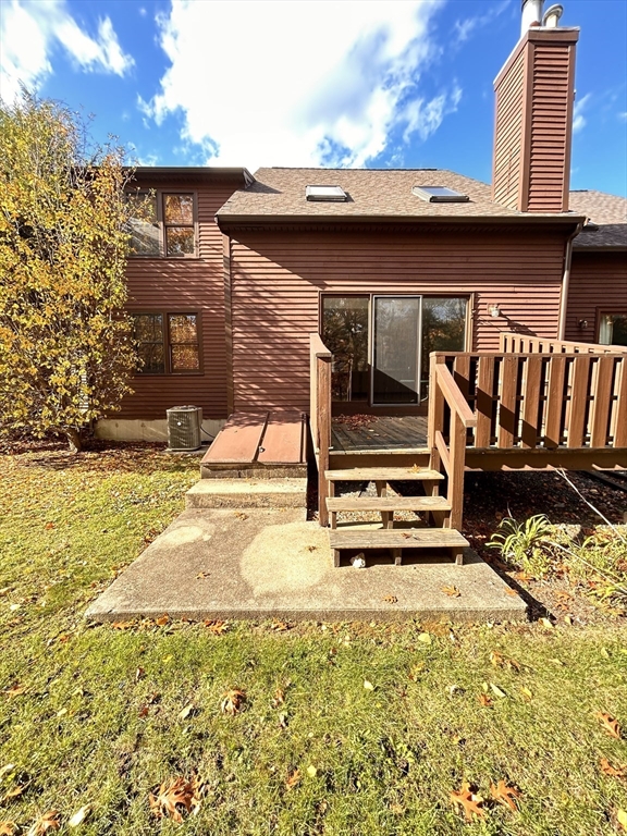 15 A Hawthorne Village, Unit D Franklin, MA 02038 - Photo 4 of 18 a view of a house with backyard