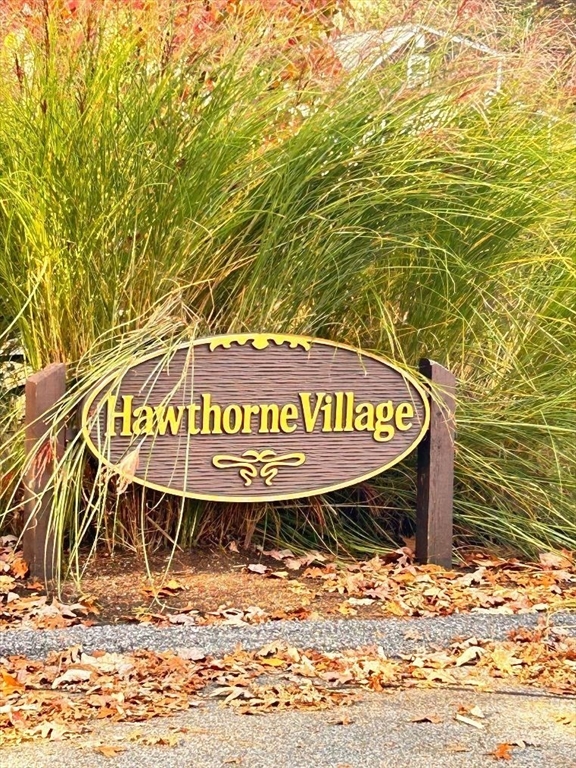 15 A Hawthorne Village, Unit D Franklin, MA 02038 - Photo 6 of 18 a sign on the side of a building