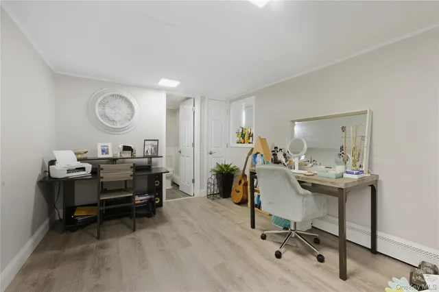 a view of a workspace with furniture