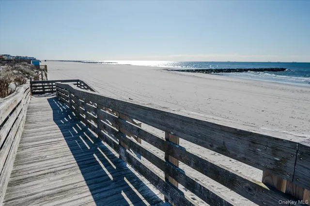 a view of a balcony with chairs