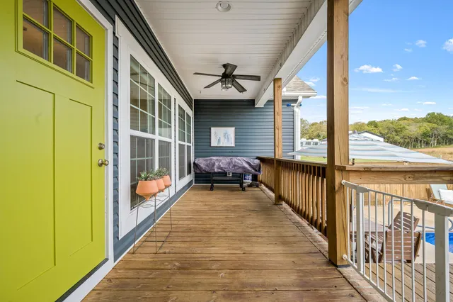 a view of a balcony with chairs