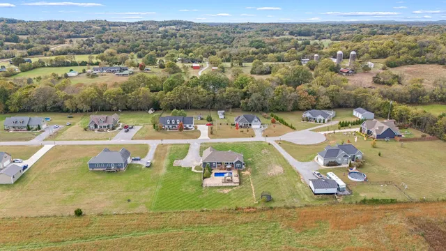 a view of a house with a big yard