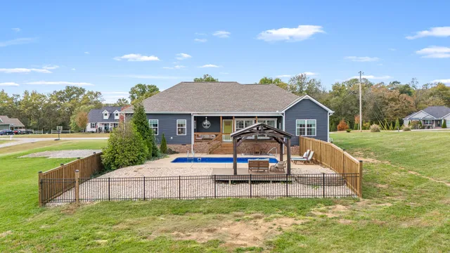 a view of a lake with houses in the background